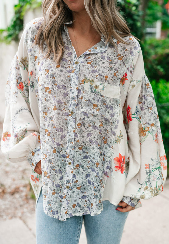 Camisa de manga larga con cuello alto y estampado floral