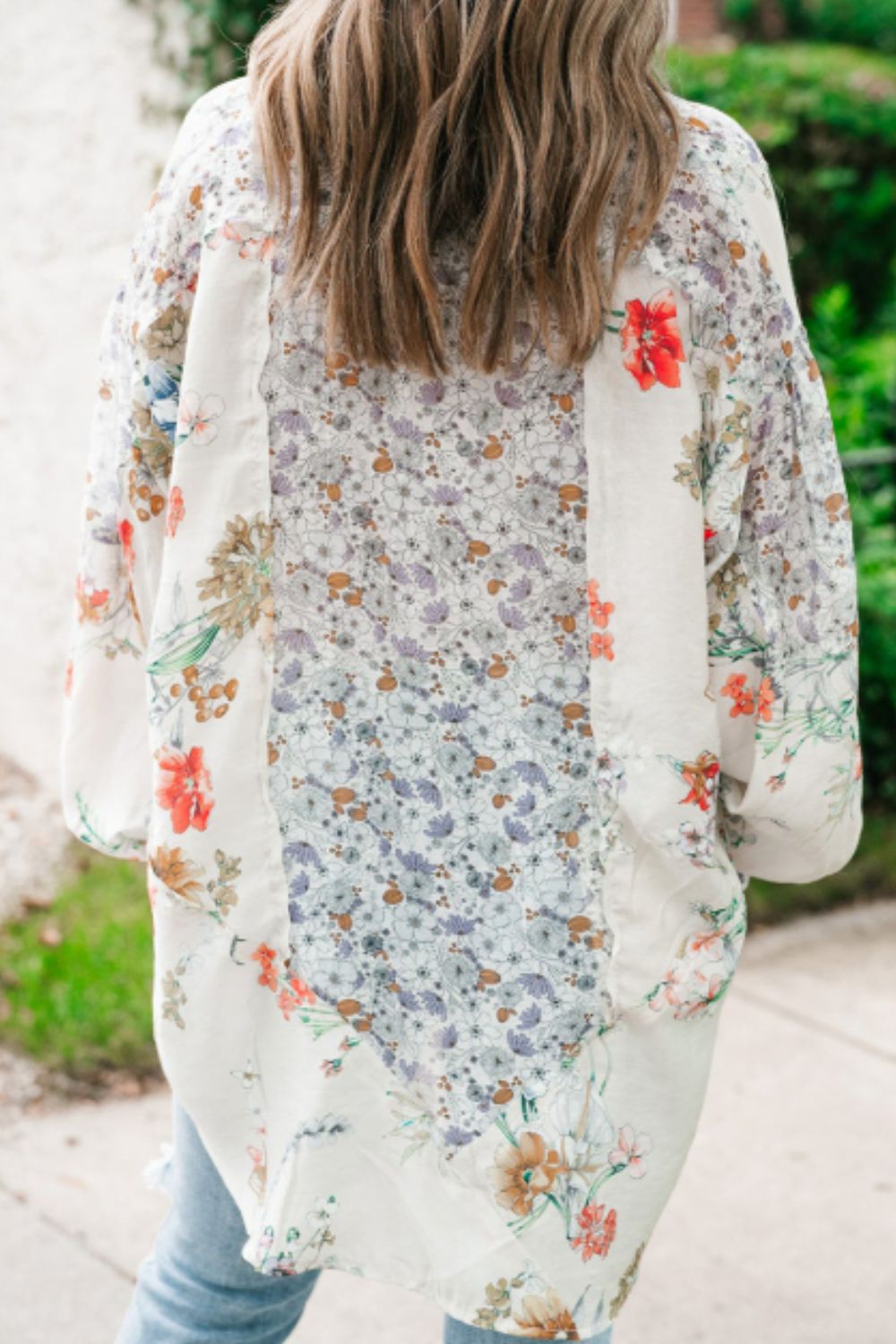 Camisa de manga larga con cuello alto y estampado floral